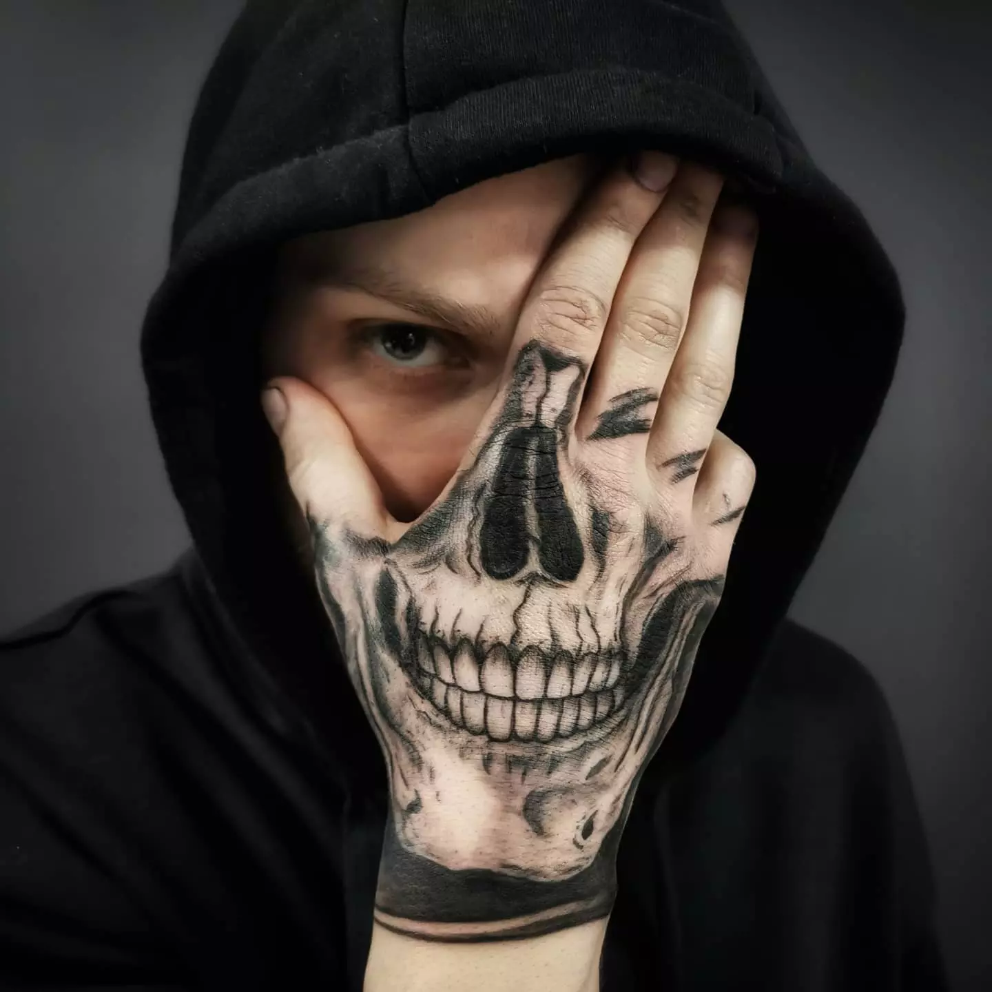 skull hand tattoo