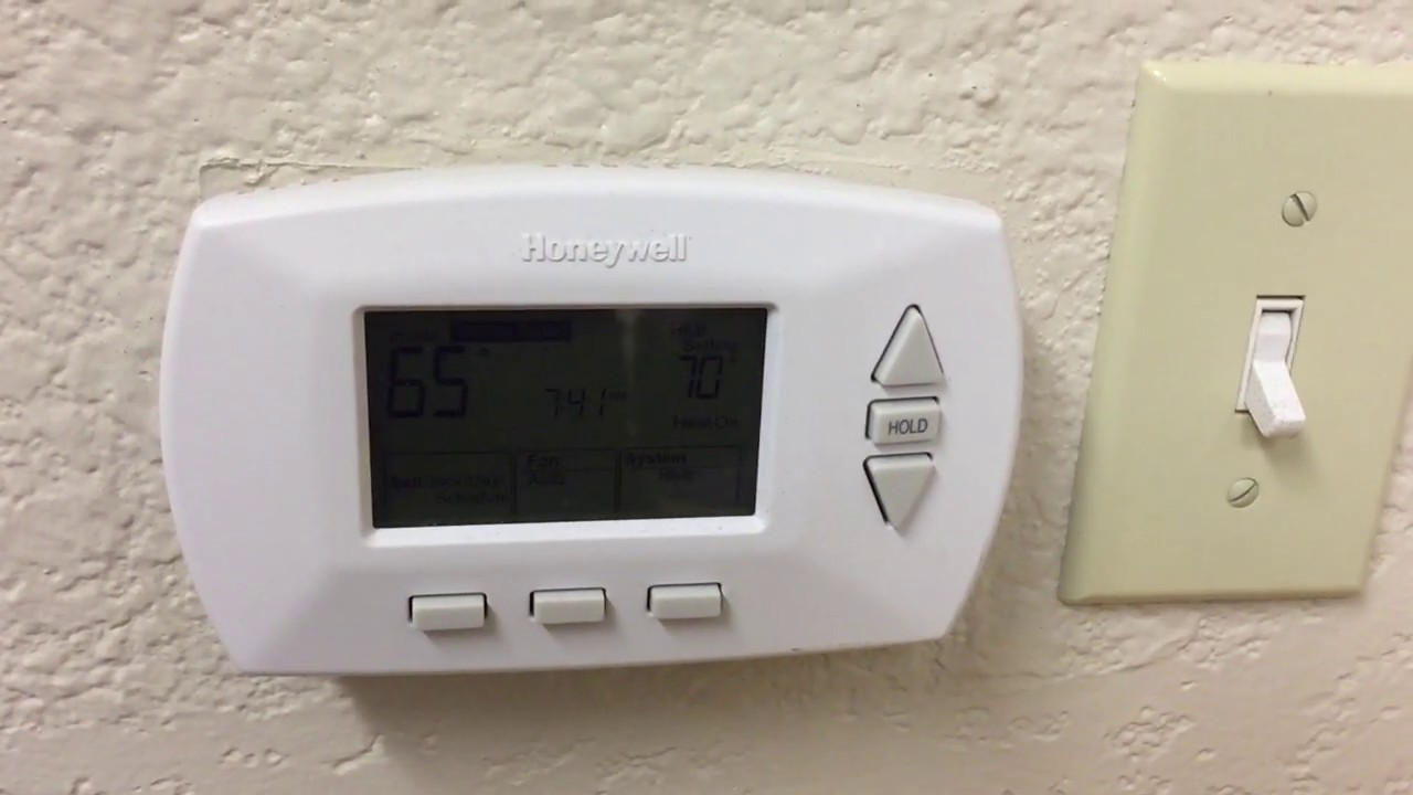 removing honeywell thermostat cover