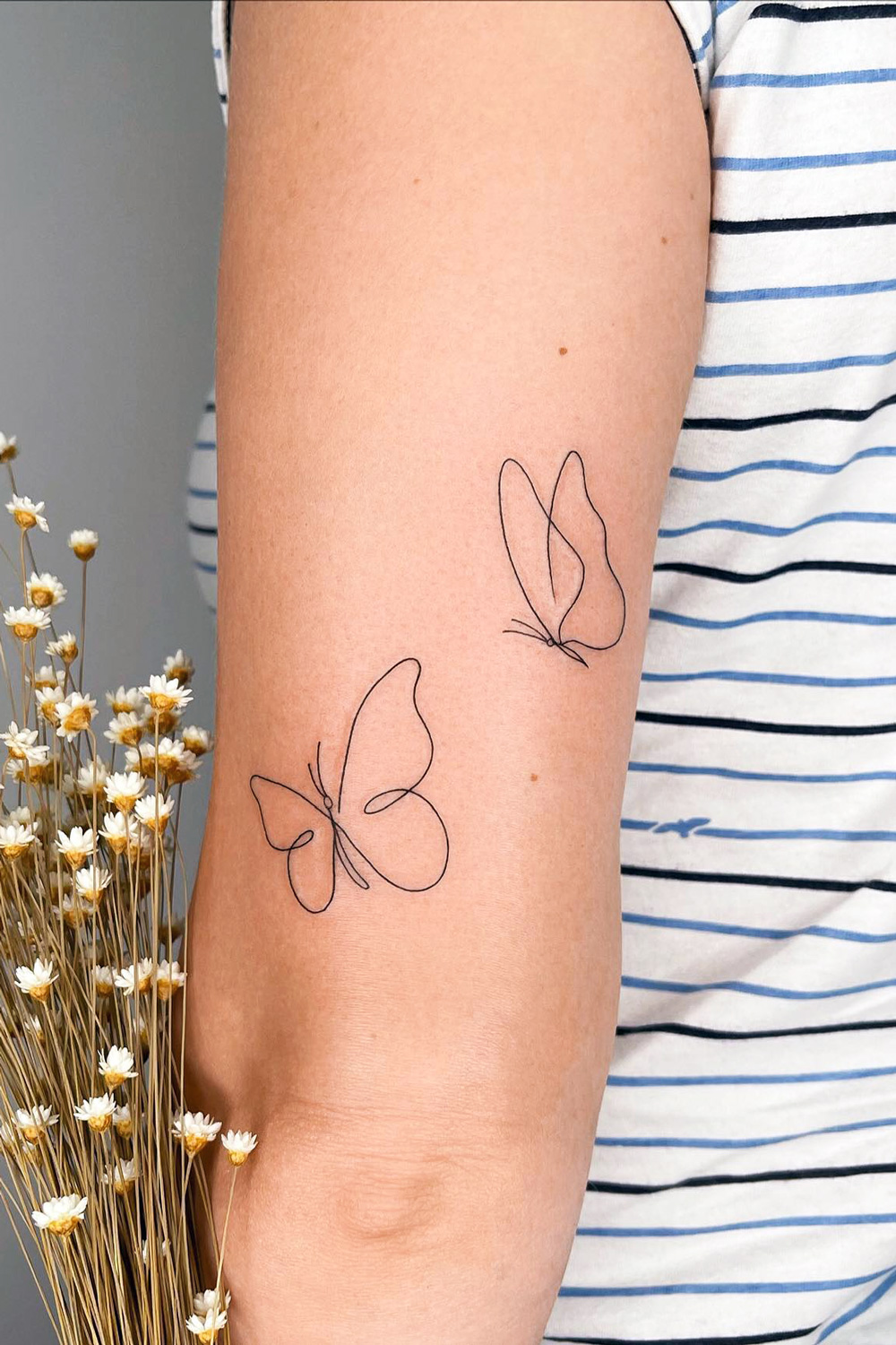 tatuajes pequeños de mariposas para mujeres