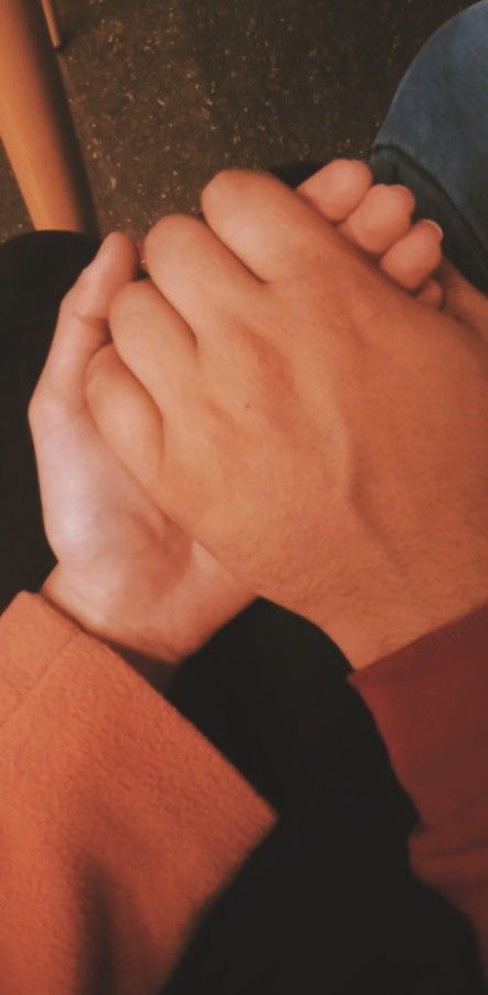 couple holding hands real images