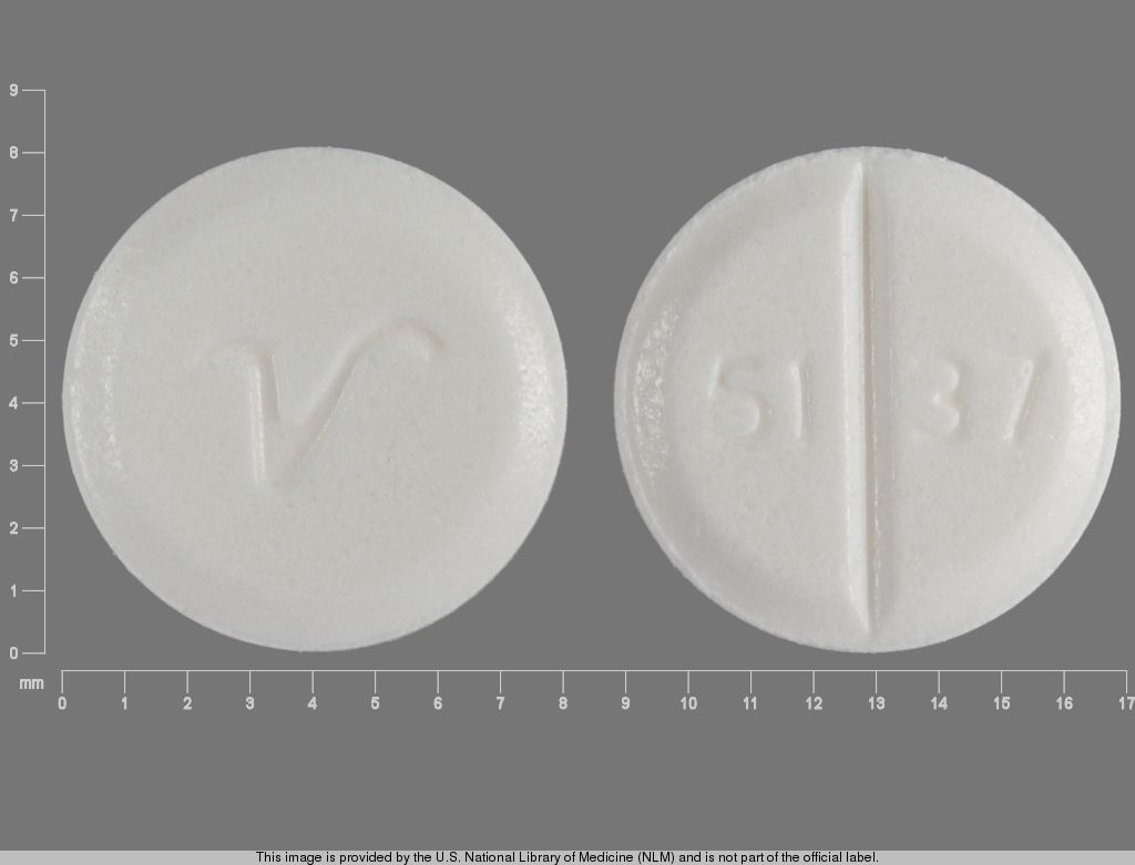 v white round pill