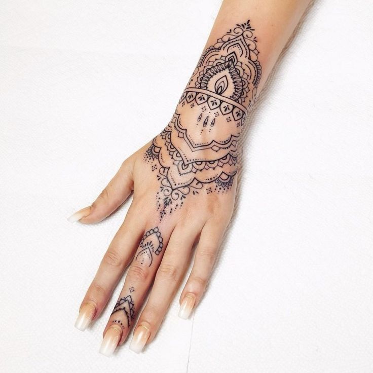 mandala tattoo hand