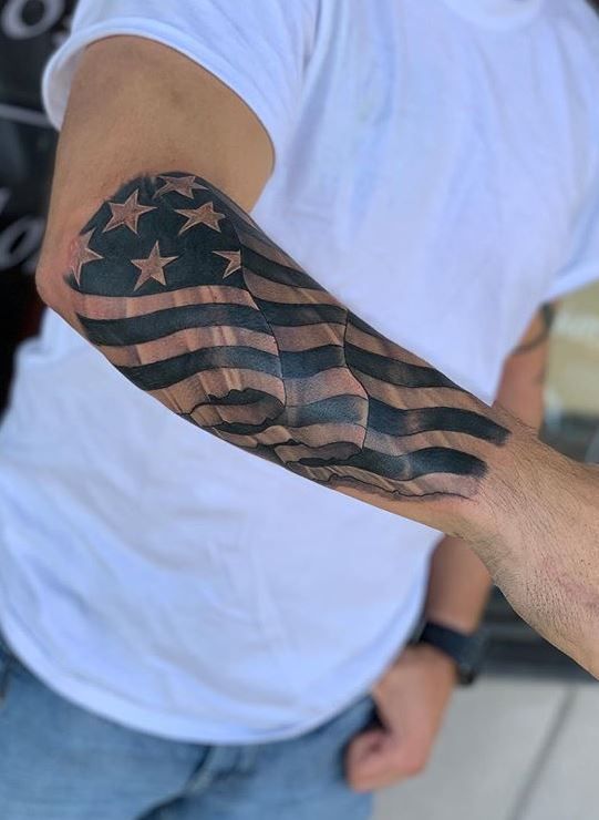 usa flag arm tattoo