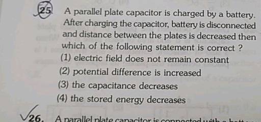 a parallel plate capacitor is charged by a battery