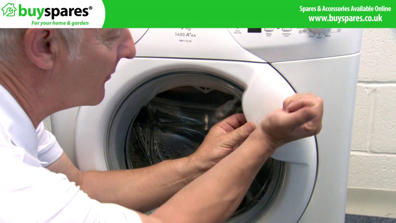 how to unlock indesit washing machine door