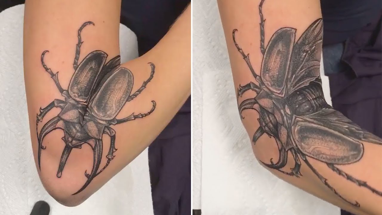 beetle tattoo elbow