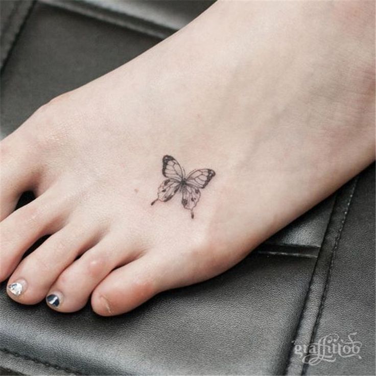 small butterfly tattoos on foot