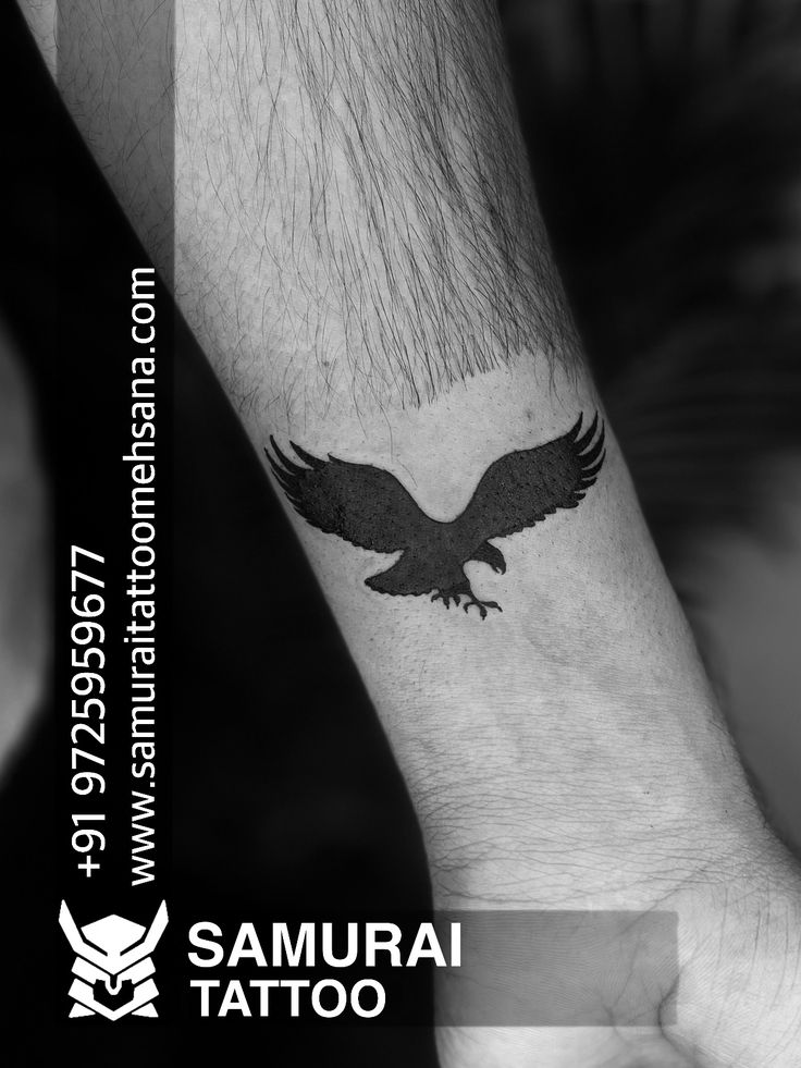 eagle tattoo on hand boy