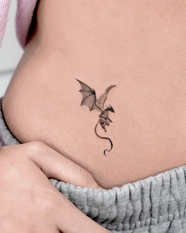 feminine simple dragon tattoo