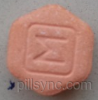 orange hexagon suboxone pill with m on it