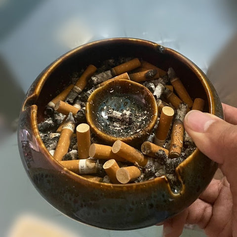 ashtray and cigarette