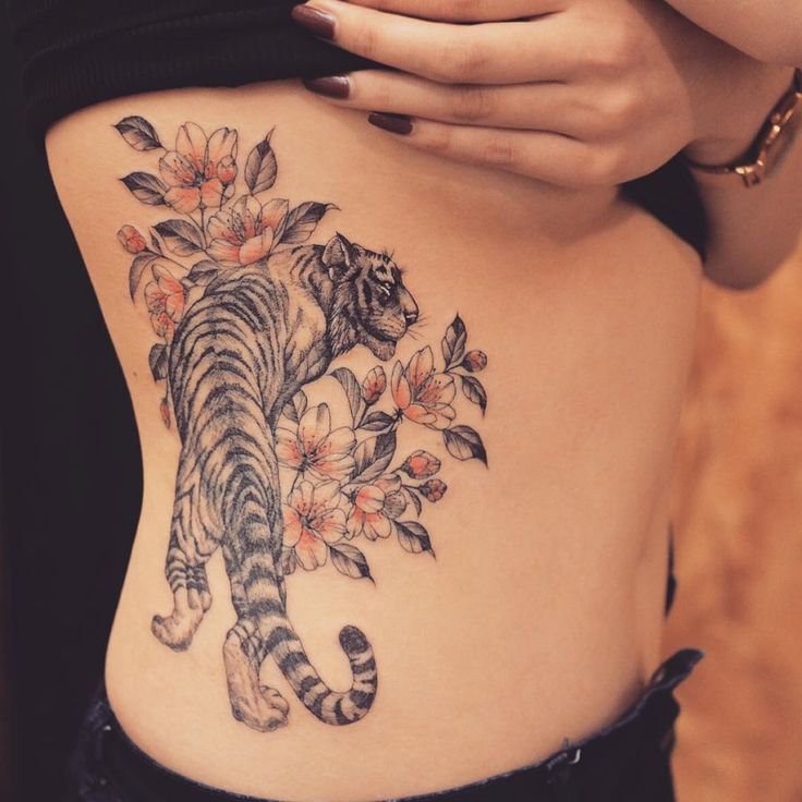 womens tiger tattoo with flowers