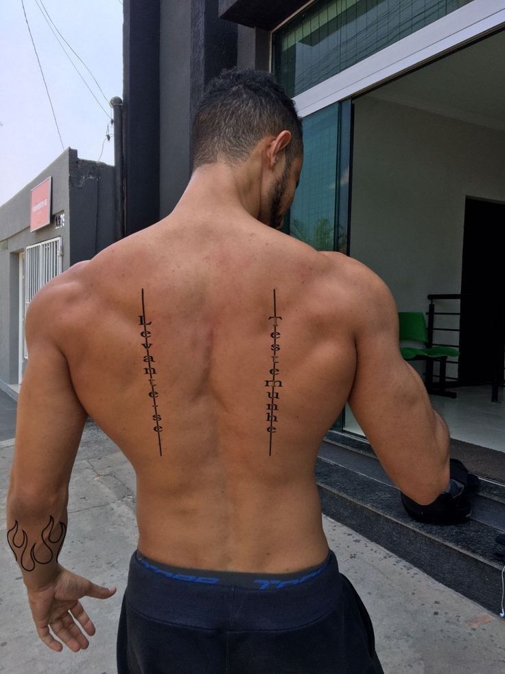 classy simple back tattoos for guys