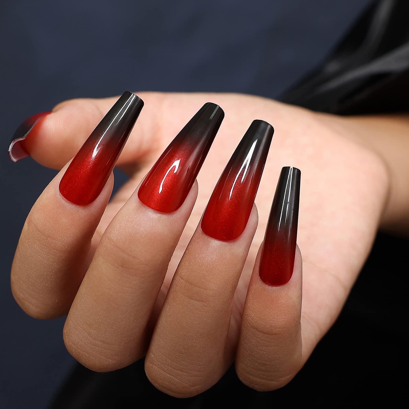 uñas acrilicas rojas con negro