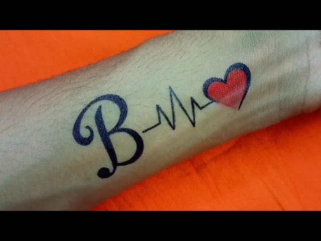 letter b tattoo on wrist