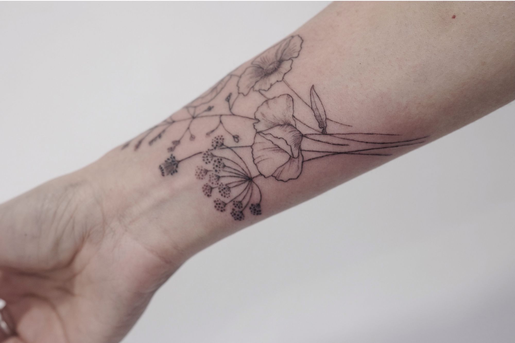 tatuajes de mujer en el brazo