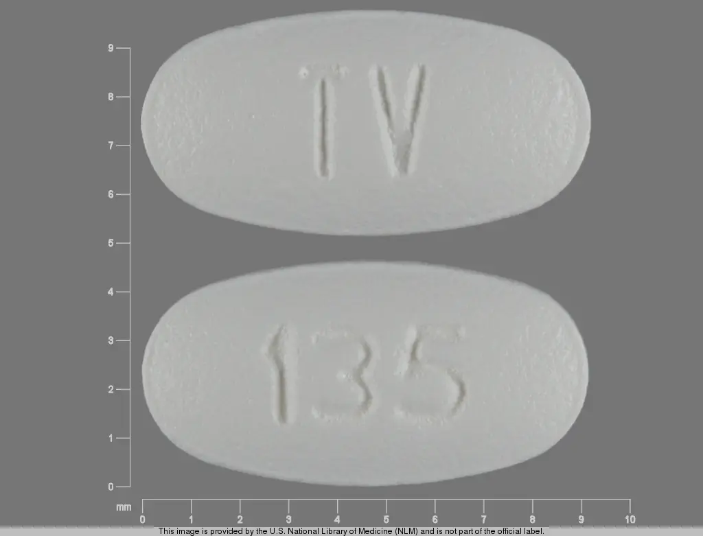 u 135 white oval pill