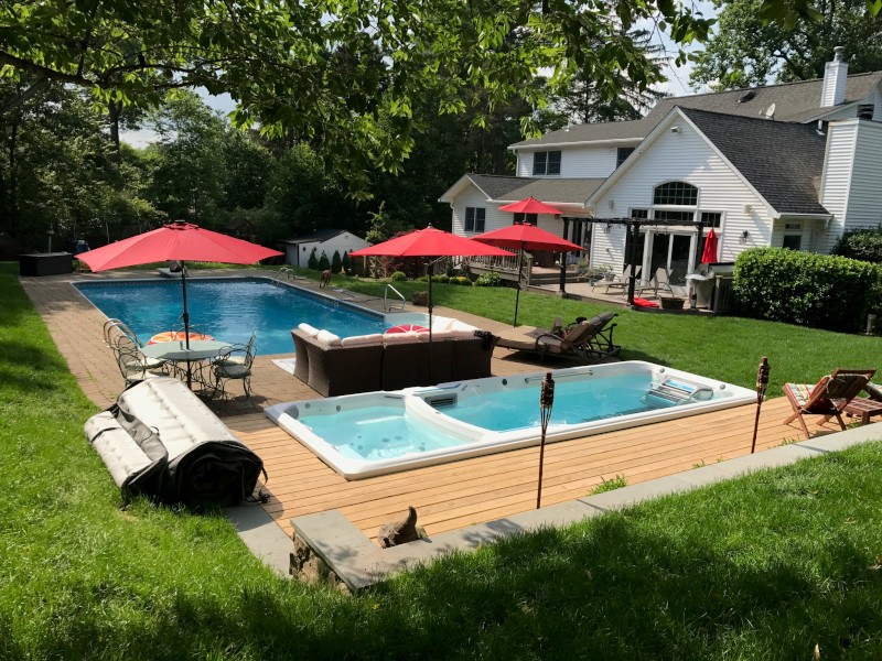 swim spa backyard designs