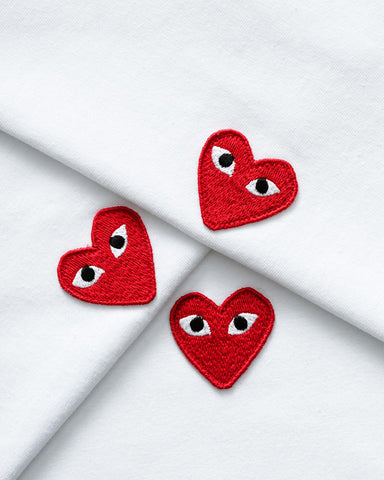 red heart with eyes brand