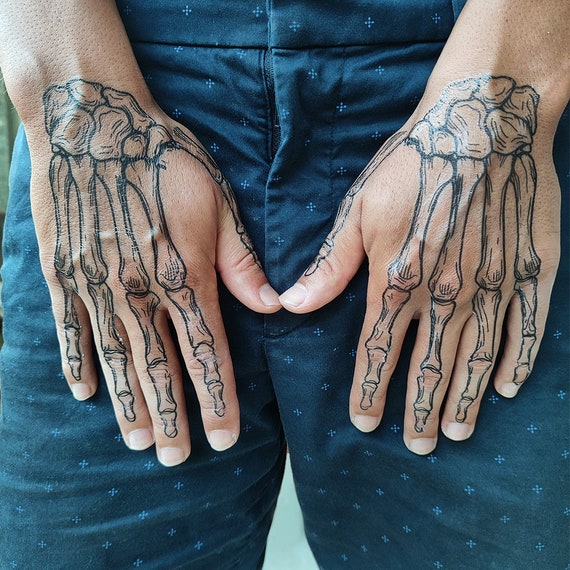 tatuajes de manos de esqueleto