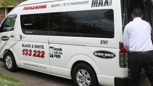 black and white maxi taxi