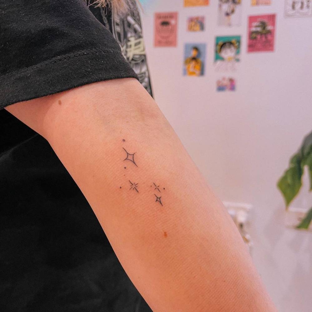 minimalist sparkle tattoo