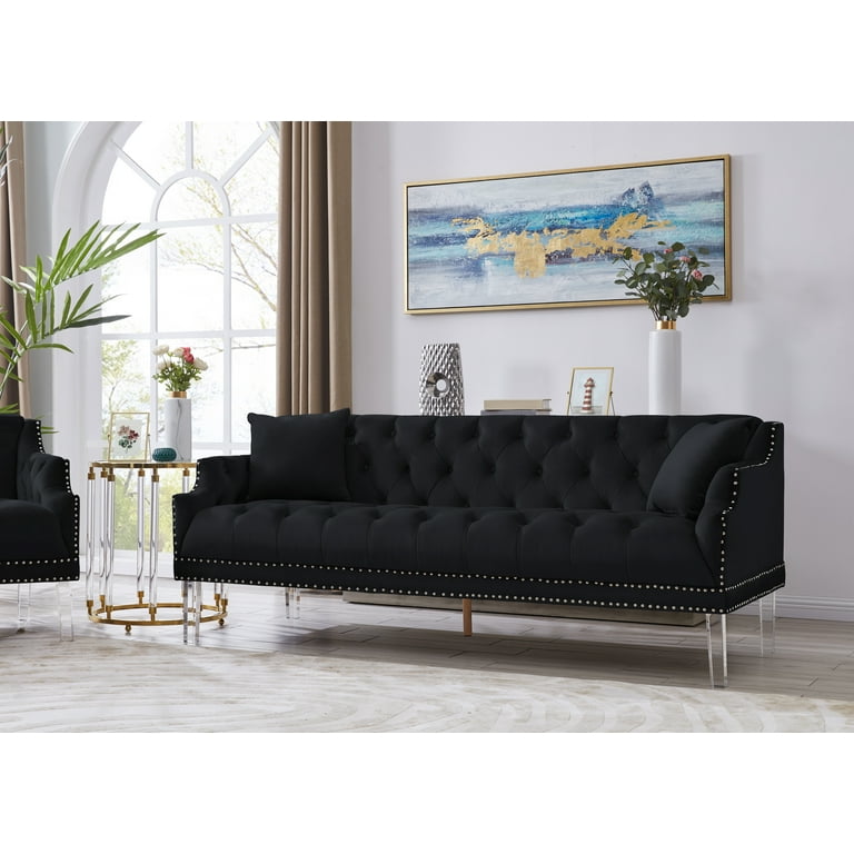 black velvet tufted sofa