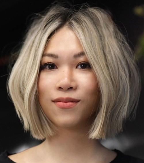 bob cut with blonde highlights