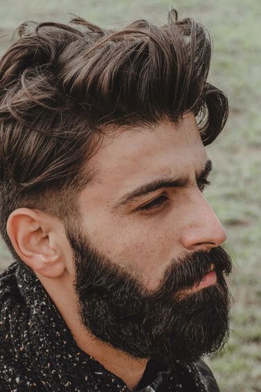 corte de cabello hombre peinado hacia atras