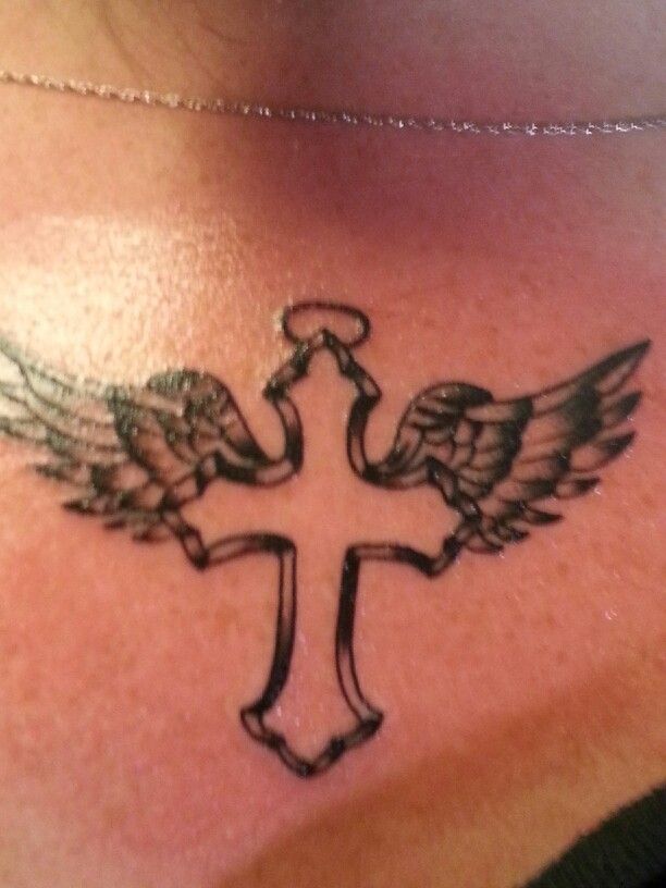 cross tattoo wings