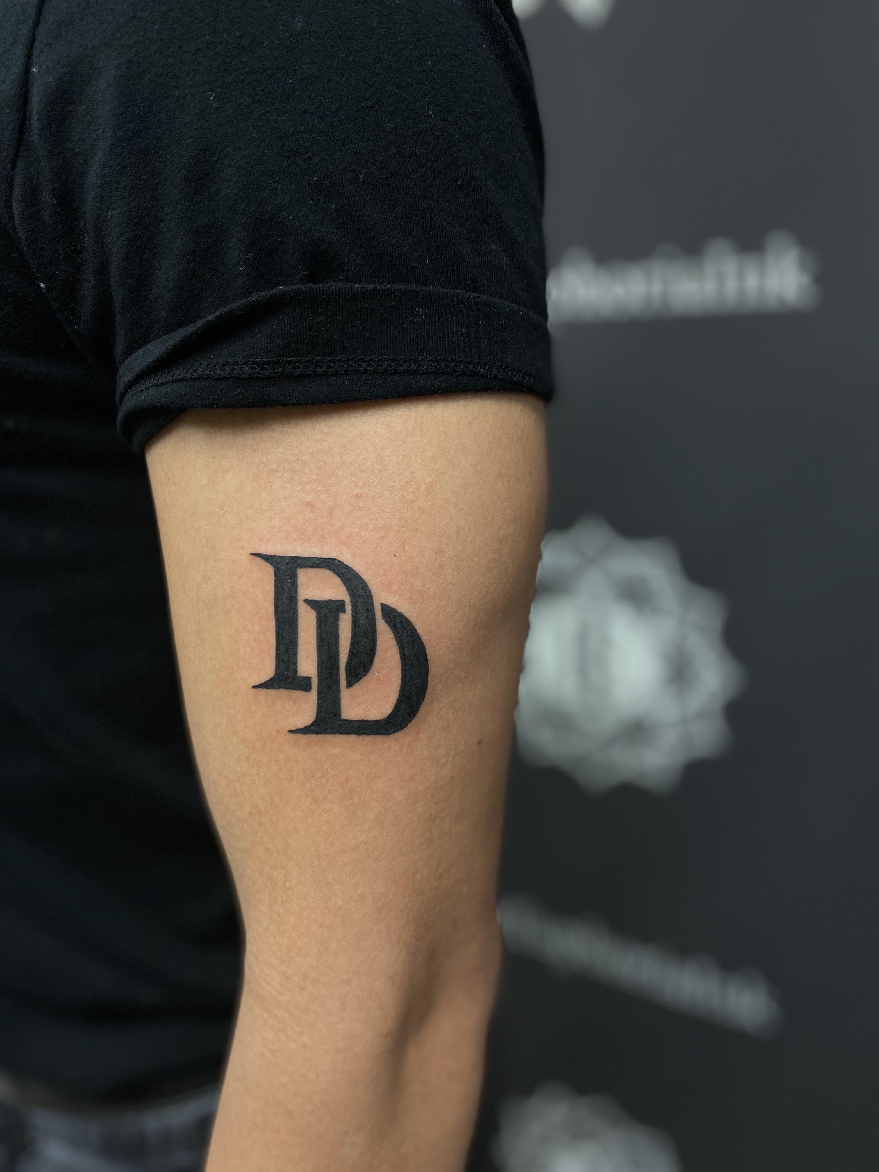 daredevil logo tattoo