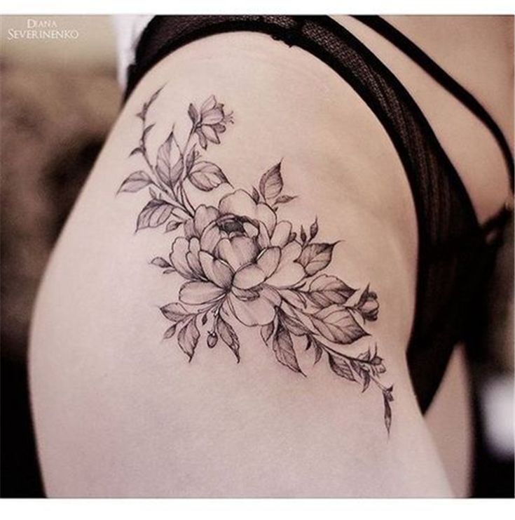 floral tattoo on thigh