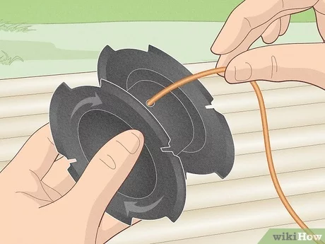 how to change weed eater string