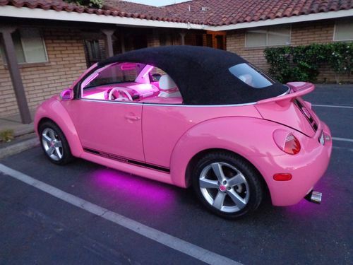 pink volkswagen beetle car