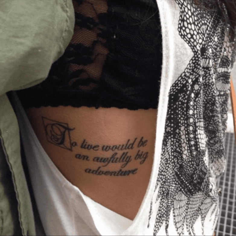 rib cage quote tattoos