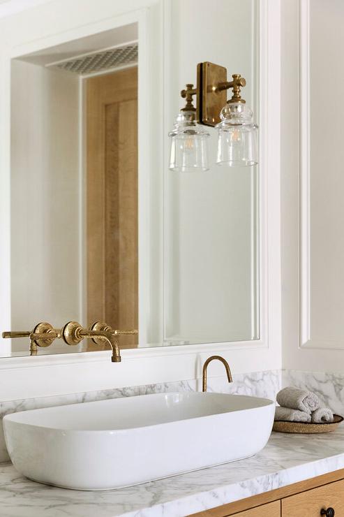 sconces on bathroom mirror