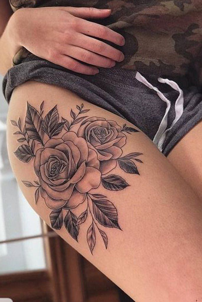 tattoo of roses on thigh