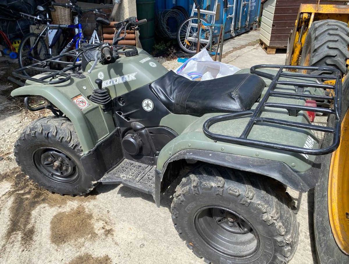 used farm quads for sale near me